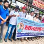 নওগাঁয় সাংবাদিকদের মর্যাদাহানি ও ফেসবুকে অপপ্রচারের প্রতিবাদে মানববন্ধন